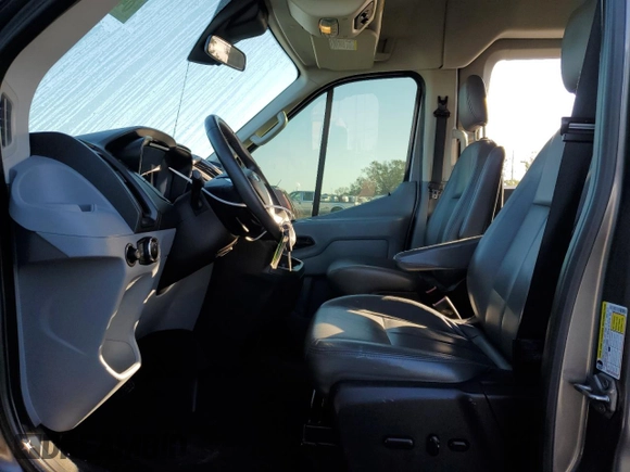 2015 Ford Transit Passenger XL with VIN 1FBAX2CGXFKA15126, listed as a Copart auction lot 84225534 with 134,178 mi miles and Salvage title. Bid and sale history available at DreamBid. Image 7.