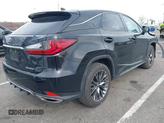 2020 Lexus RX with VIN 2T2SZMDA8LC256854, listed as a IAAI auction lot 41822801 with 74,814 mi miles. Bid and sale history available at carsss.com. Image 4.