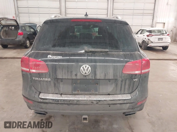 2012 Volkswagen Touareg Sport with VIN WVGEF9BP8CD009511, listed as a IAAI auction lot 41457989 with 87,325 mi miles and . Bid and sale history available at DreamBid. Image 17.