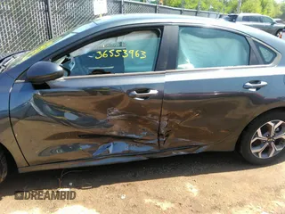 2019 Kia Forte LXS with VIN 3KPF24AD2KE112760, listed as a IAAI auction lot 36553963 with 51,192 mi miles and . Bid and sale history available at carsss.com. Image 6.