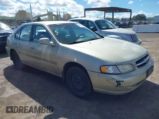 1999 Nissan Altima XE with VIN 1N4DL01D6XC179556, listed as a IAAI auction lot 41783234 with 129,064 mi miles. Bid and sale history available at carsss.com. Image 1.