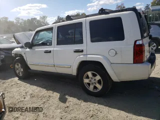 2006 Jeep Commander with VIN 1J8HG48N26C123370, listed as a Copart auction lot 42310645 with 94,985 mi miles and Salvage title. Bid and sale history available at DreamBid. Image 2.