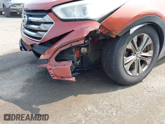 2014 Hyundai Santa Fe z VIN 5XYZTDLB0EG208769, wystawiony jako IAAI lot #42485411 z przebiegiem 82 173 mil mil oraz . Historia ofert i sprzedaży dostępna na DreamBid. Obrazek 6.