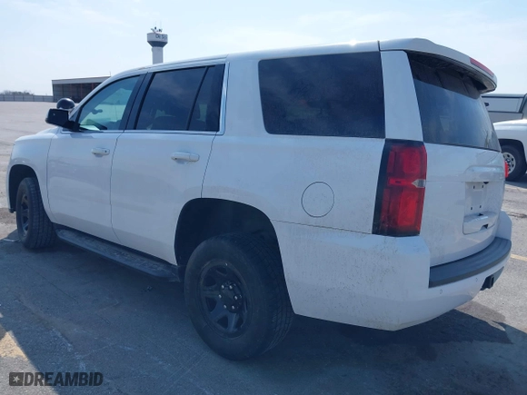 2020 Chevrolet Tahoe Commercial with VIN 1GNSKDEC5LR261015, listed as a IAAI auction lot 42001083 with 110,668 mi miles. Bid and sale history available at carsss.com. Image 3.