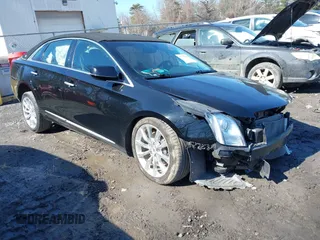 2015 Cadillac XTS Luxury z VIN 2G61M5S38F9162148, wystawiony jako IAAI lot #41771529 z przebiegiem 48 537 mil mil oraz . Historia ofert i sprzedaży dostępna na DreamBid. Obrazek 1.