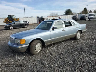 1986 Mercedes-Benz 300 with VIN WDBCB25D9GA279756, listed as a Copart auction lot 46860345 with 210,386 mi miles and Salvage Title. Bid and sale history available at carsss.com. Image 1.