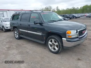 2005 GMC Yukon XL SLT z VIN 3GKFK16Z55G291974, wystawiony jako IAAI lot #42235639 z przebiegiem 245 722 mil mil oraz . Historia ofert i sprzedaży dostępna na DreamBid. Obrazek 1.