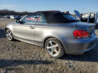 2012 BMW 1 Series 128i with VIN WBAUL7C58CVM82827, listed as a Copart auction lot 87487274 with 60,842 mi miles and Salvage Title. Bid and sale history available at carsss.com. Image 2.
