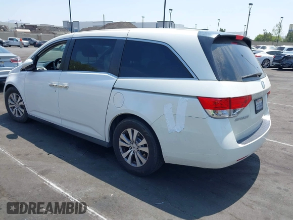 2015 Honda Odyssey EX-L with VIN 5FNRL5H62FB106545, listed as a IAAI auction lot 42115849 with 122,718 mi miles and . Bid and sale history available at DreamBid. Image 3.