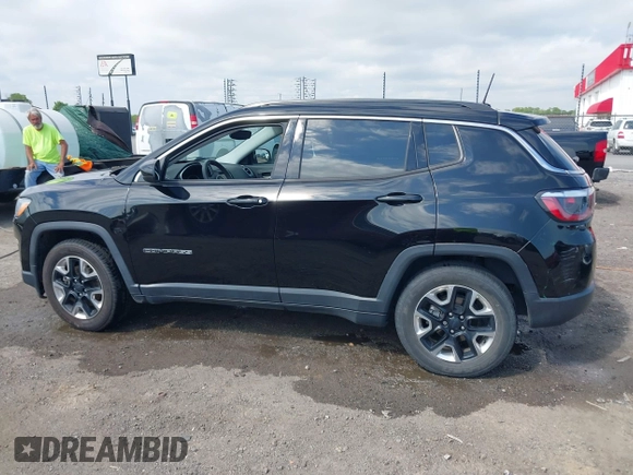 2021 Jeep Compass Altitude with VIN 3C4NJCBB0MT502423, listed as a IAAI auction lot 42006742 with 63,418 mi miles. Bid and sale history available at carsss.com. Image 14.