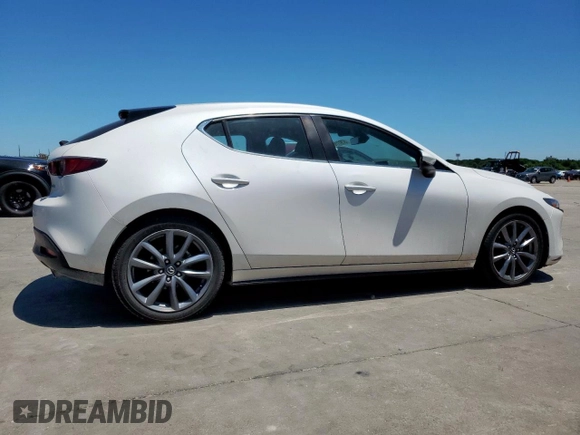 2019 Mazda 3 z VIN JM1BPAJM3K1131108, wystawiony jako Copart lot #57911165 z przebiegiem 65 641 mil mil oraz Szkoda całkowita • Salvage title. Historia ofert i sprzedaży dostępna na DreamBid. Obrazek 3.