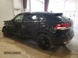 2023 Volkswagen Atlas SE z VIN 1V2HE2CA0PC222288, wystawiony jako Copart lot #57166165 z przebiegiem 18 142 mil mil oraz Szkoda całkowita • Salvage title. Historia ofert i sprzedaży dostępna na DreamBid. Obrazek 2.