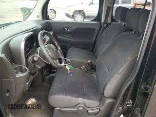 2013 Nissan Cube SL z VIN JN8AZ2KR3DT302313, wystawiony jako Copart lot #54845105 z przebiegiem 123 320 mil mil oraz Szkoda całkowita • Salvage title. Historia ofert i sprzedaży dostępna na DreamBid. Obrazek 7.