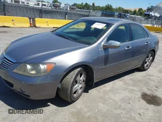 2005 Acura RL z VIN JH4KB16565C002626, wystawiony jako IAAI lot #42522273 z przebiegiem 293 980 mil mil oraz . Historia ofert i sprzedaży dostępna na DreamBid. Obrazek 2.