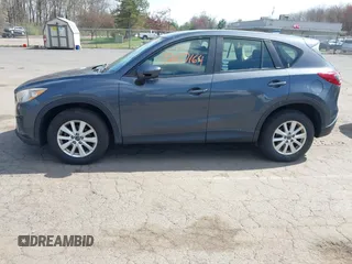 2013 Mazda CX-5 Sport with VIN JM3KE4BE7D0164398, listed as a IAAI auction lot 42107164 with 166,852 mi miles. Bid and sale history available at carsss.com. Image 14.