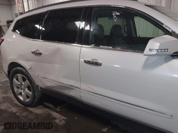 2017 Chevrolet Traverse Premier with VIN 1GNKVJKD9HJ340891, listed as a IAAI auction lot 41601595 with 96,647 mi miles and . Bid and sale history available at DreamBid. Image 6.