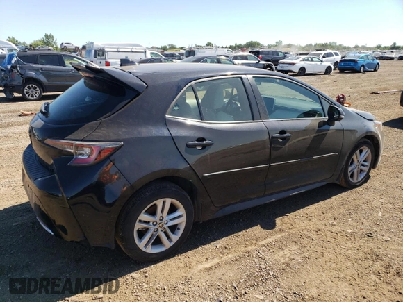 2022 Toyota Corolla Hatchback SE with VIN JTND4MBE7N3186739, listed as a Copart auction lot 60488754 with 10,511 mi miles and Salvage Title. Bid and sale history available at carsss.com. Image 3.