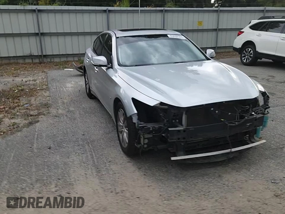 2014 Infiniti Q50 Premium with VIN JN1BV7AP4EM671611, listed as a Copart auction lot 63698505 with 134,904 mi miles and Salvage title. Bid and sale history available at DreamBid. Image 14.