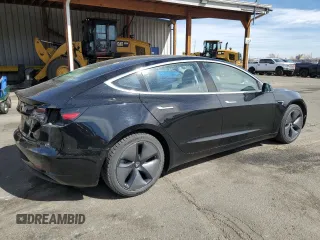 2018 Tesla Model 3 Long Range Battery with VIN 5YJ3E1EB9JF103256, listed as a Copart auction lot 49617885 with 119,653 mi miles and Salvage Title. Bid and sale history available at carsss.com. Image 3.