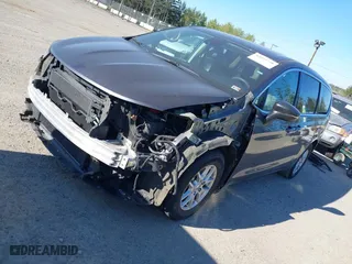 2023 Chrysler Pacifica Touring L with VIN 2C4RC1BG5PR550499, listed as a IAAI auction lot 42055738 with 53,137 mi miles. Bid and sale history available at carsss.com. Image 18.