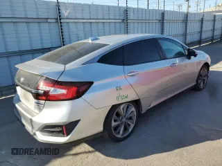 2020 Honda Clarity Touring z VIN JHMZC5F3XLC001848, wystawiony jako Copart lot #56748915 z przebiegiem 89 652 mil mil oraz Szkoda całkowita • Salvage title. Historia ofert i sprzedaży dostępna na DreamBid. Obrazek 3.