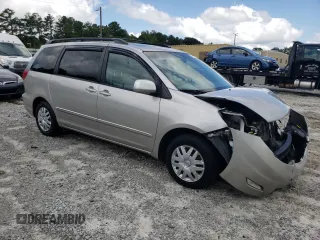 2010 Toyota Sienna XLE with VIN 5TDYK4CC5AS340124, listed as a Copart auction lot 66178854 with 99,485 mi miles and Salvage Title. Bid and sale history available at carsss.com. Image 4.