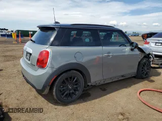 2015 MINI Hardtop with VIN WMWXM5C5XFT974077, listed as a Copart auction lot 58063965 with 93,853 mi miles and Salvage title. Bid and sale history available at DreamBid. Image 3.