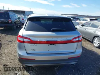 2016 Lincoln MKX Premiere with VIN 2LMTJ6JR4GBL62187, listed as a IAAI auction lot 41601593 with 94,566 mi miles. Bid and sale history available at carsss.com. Image 16.