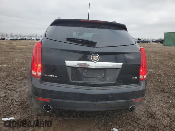 2014 Cadillac SRX Luxury Collection z VIN 3GYFNEE34ES685593, wystawiony jako Copart lot #52202805 z przebiegiem 139 869 mil mil oraz Szkoda całkowita • Salvage title. Historia ofert i sprzedaży dostępna na DreamBid. Obrazek 6.