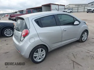 2015 Chevrolet Spark LS with VIN KL8CB6S95FC736907, listed as a IAAI auction lot 42170458 with 102,915 mi miles and . Bid and sale history available at DreamBid. Image 4.