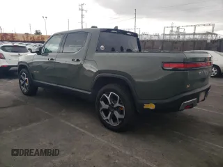 2022 Rivian R1T Launch Edition z VIN 7FCTGAAL0NN001256, wystawiony jako Copart lot #55850845 z przebiegiem 49 236 mil mil oraz Szkoda całkowita • Salvage title. Historia ofert i sprzedaży dostępna na DreamBid. Obrazek 2.