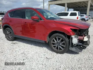 2018 Mazda CX-5 Grand Touring with VIN JM3KFADM7J0399895, listed as a Copart auction lot 47598265 with 0 mi miles and Salvage Title. Bid and sale history available at carsss.com. Image 4.