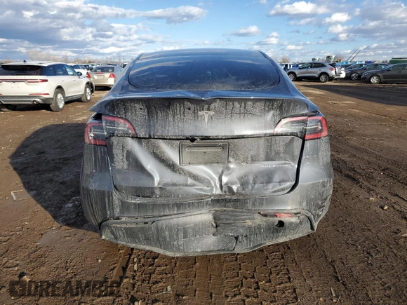 2022 Tesla Model Y Long Range with VIN 7SAYGDEE7NF386082, listed as a Copart auction lot 47191625 with 73,634 mi miles and Salvage Title. Bid and sale history available at carsss.com. Image 6.