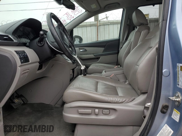2014 Honda Odyssey EX-L with VIN 5FNRL5H68EB103941, listed as a Copart auction lot 60715095 with 109,013 mi miles and Salvage title. Bid and sale history available at DreamBid. Image 7.