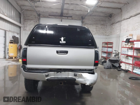 2011 Toyota Tacoma with VIN 3TMLU4EN9BM070836, listed as a IAAI auction lot 41668595 with 89,879 mi miles and . Bid and sale history available at DreamBid. Image 16.