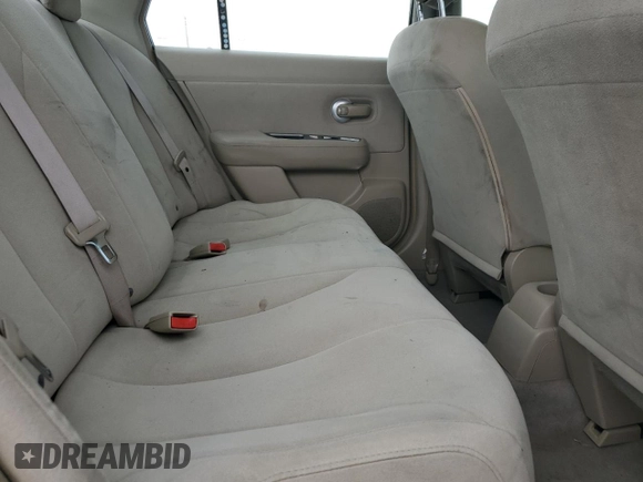 2009 Nissan Versa S with VIN 3N1BC11E19L433572, listed as a Copart auction lot 54084215 with 144,178 mi miles and Salvage title. Bid and sale history available at DreamBid. Image 10.