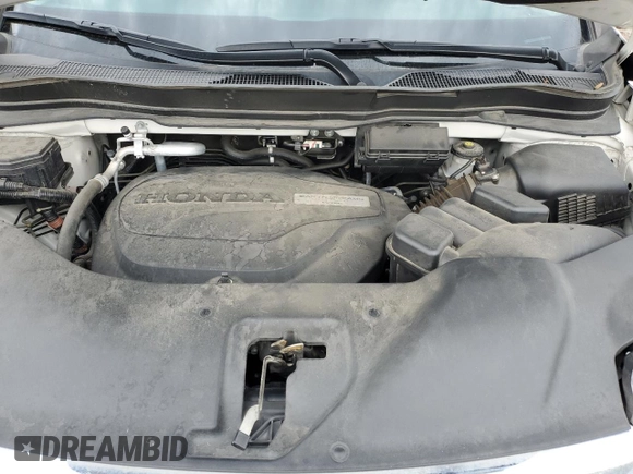 2018 Honda Pilot EX-L with VIN 5FNYF5H52JB023815, listed as a Copart auction lot 57692995 with 65,065 mi miles and Salvage title. Bid and sale history available at DreamBid. Image 12.