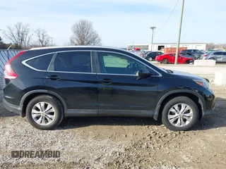 2014 Honda CR-V EX-L with VIN 2HKRM4H79EH688854, listed as a IAAI auction lot 41797298 with 168,658 mi miles. Bid and sale history available at carsss.com. Image 13.