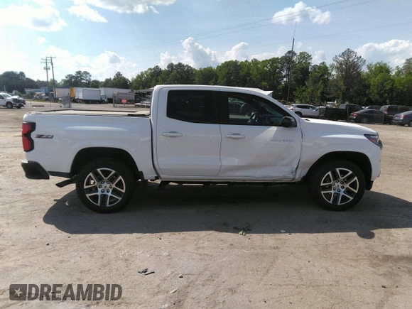 2023 Chevrolet Colorado 4WD Z71 with VIN 1GCPTDEK4P1249624, listed as a IAAI auction lot 42130950 with 9,795 mi miles and . Bid and sale history available at DreamBid. Image 13.