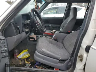 1997 Jeep Cherokee Sport with VIN 1J4FJ68S2VL566709, listed as a Copart auction lot 44800385 with 191,654 mi miles and Non Repairable. Bid and sale history available at carsss.com. Image 7.