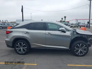 2021 Lexus RX 450h with VIN 2T2HGMDA3MC060208, listed as a IAAI auction lot 42163455 with 34,167 mi miles and . Bid and sale history available at DreamBid. Image 14.