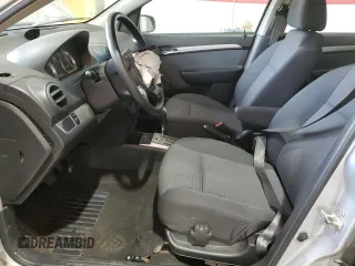 2011 Chevrolet Aveo 1LT with VIN KL1TD5DE2BB230142, listed as a Copart auction lot 57293695 with Not provided miles and Salvage title. Bid and sale history available at DreamBid. Image 7.