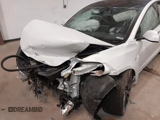 2021 Tesla Model 3 Performance with VIN 5YJ3E1ECXMF991836, listed as a IAAI auction lot 41830519 with Not Provided miles and . Bid and sale history available at carsss.com. Image 6.