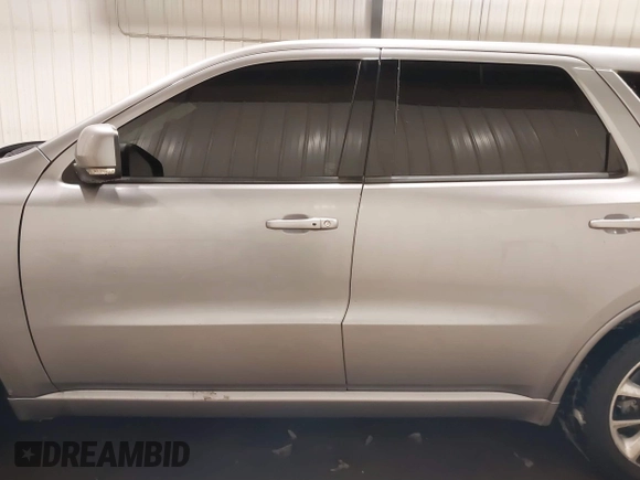 2014 Dodge Durango R/T with VIN 1C4SDJCTXEC558937, listed as a IAAI auction lot 41570244 with 174,724 mi miles and . Bid and sale history available at DreamBid. Image 15.