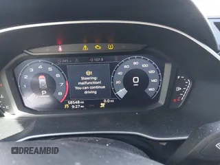 2020 Audi Q3 S line Premium z VIN WA1DECF31L1030946, wystawiony jako IAAI lot #41774297 z przebiegiem 58 548 mil mil oraz . Historia ofert i sprzedaży dostępna na DreamBid. Obrazek 7.