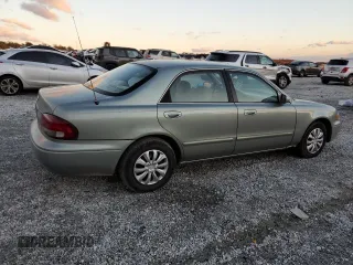 1999 Mazda 626 ES with VIN 1YVGF22C1X5846046, listed as a Copart auction lot 86368224 with 163,172 mi miles and Non Repairable. Bid and sale history available at carsss.com. Image 3.