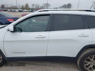 2014 Jeep Cherokee Latitude with VIN 1C4PJMCSXEW150735, listed as a IAAI auction lot 42020944 with 76,303 mi miles and . Bid and sale history available at carsss.com. Image 15.