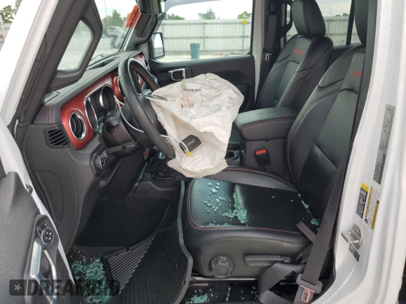 2021 Jeep Gladiator Rubicon z VIN 1C6JJTBG0ML624275, wystawiony jako Copart lot #62840275 z przebiegiem Nie podano mil oraz Szkoda całkowita • Salvage title. Historia ofert i sprzedaży dostępna na DreamBid. Obrazek 7.