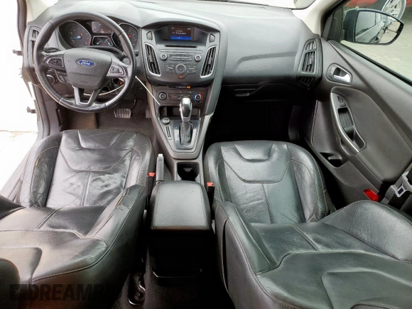 2015 Ford Focus SE z VIN 1FADP3F29FL357021, wystawiony jako Copart lot #57985125 z przebiegiem 142 786 mil mil oraz Szkoda całkowita • Salvage title. Historia ofert i sprzedaży dostępna na DreamBid. Obrazek 8.