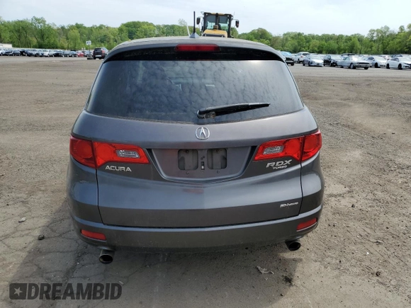 2009 Acura RDX z VIN 5J8TB18289A004485, wystawiony jako Copart lot #56356035 z przebiegiem 228 783 mil mil oraz Szkoda całkowita • Salvage title. Historia ofert i sprzedaży dostępna na DreamBid. Obrazek 6.